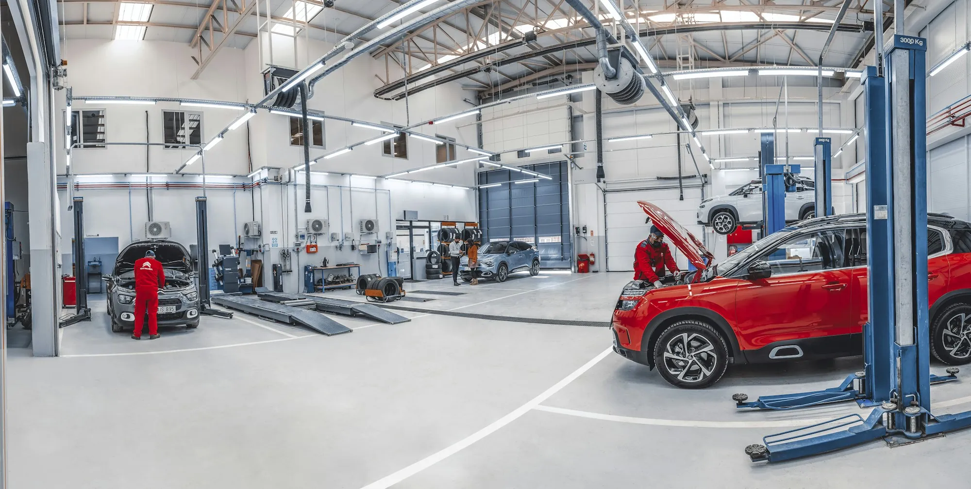 Spacious repair shop with lifts and work bays