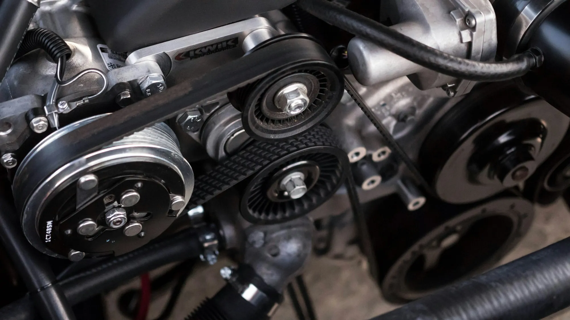Engine belts and pulleys close up